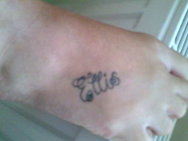 My sons Name tattoo