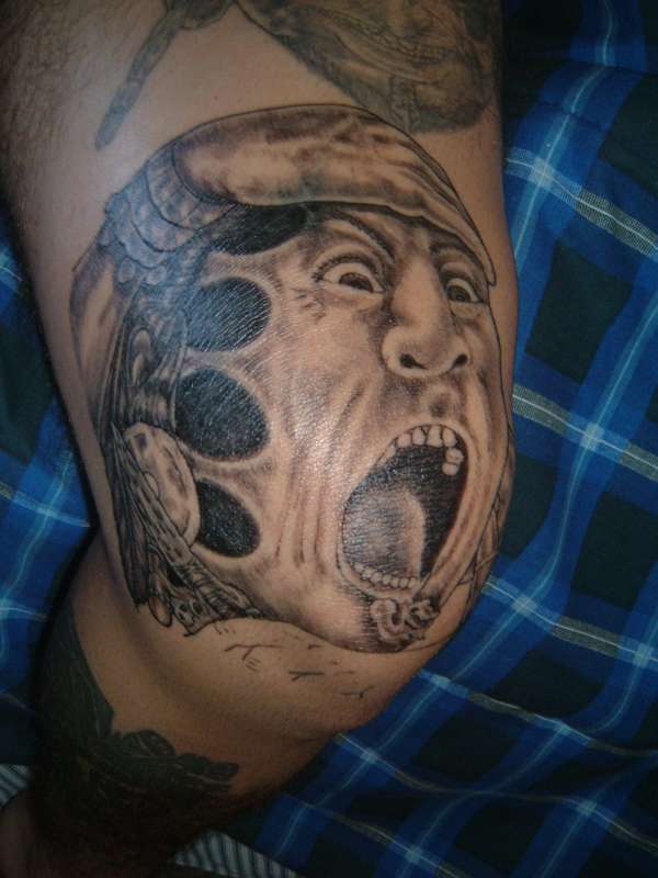 Aztec face tattoo