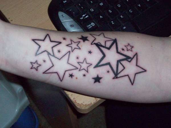 lower arm stars tattoo