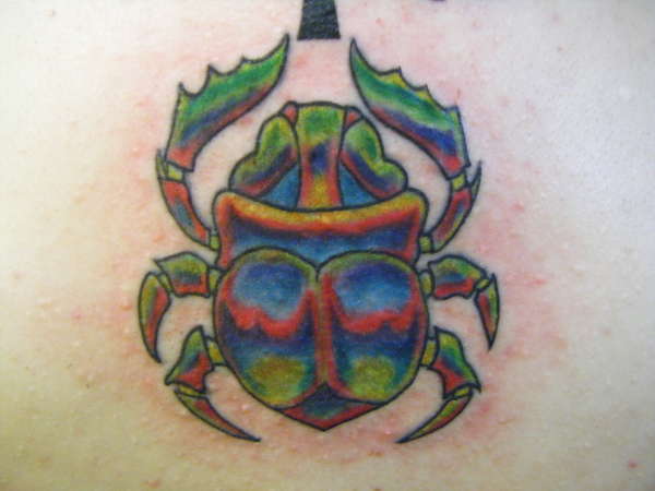 Between the shoulder blades tattoo