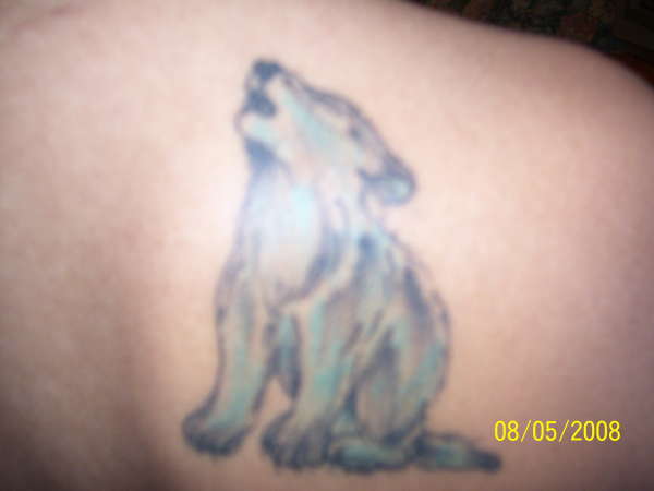 Howling wolf tattoo