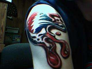 Melting Steal Your Face tattoo