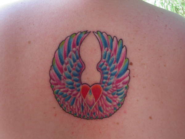 Buddhist Mandala wings tattoo