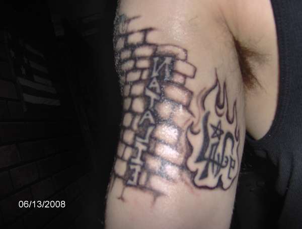 second view of the same tat tattoo