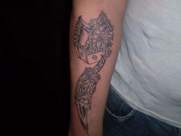 Tattoo gun with aztec designes on it tattoo
