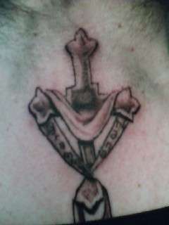 A cross to remember tattoo