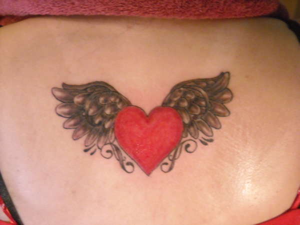 Heart with wings tattoo