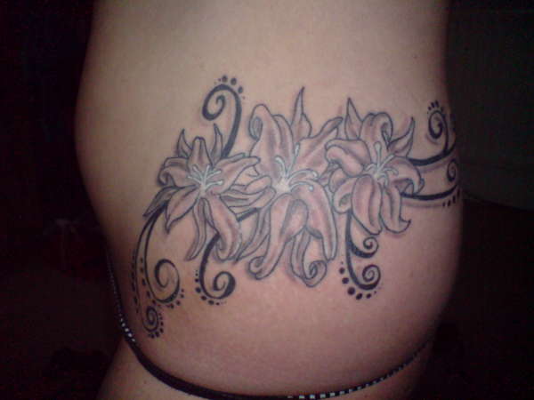 flowers an swirlssss tattoo