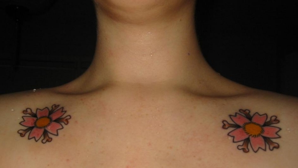 cherry blossoms w/ crossbones tattoo