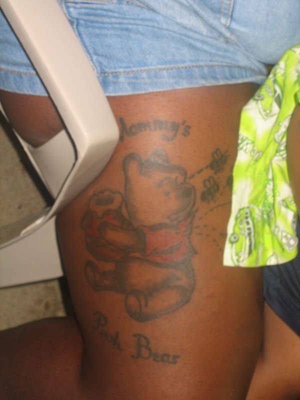 Thigh high Pooh Bear tattoo