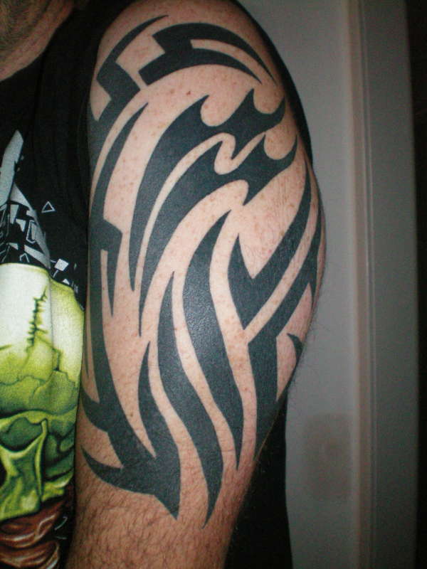 Aquarius Tribal tattoo
