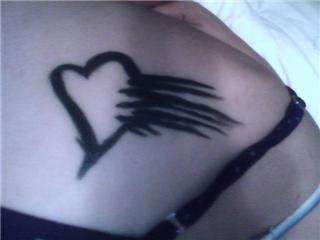 Odd Project Scratched heart tattoo