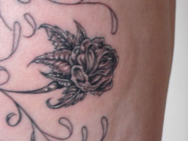 Close up of Rose tattoo