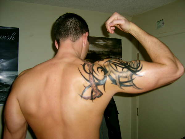 Tribal Shoulder Piece tattoo