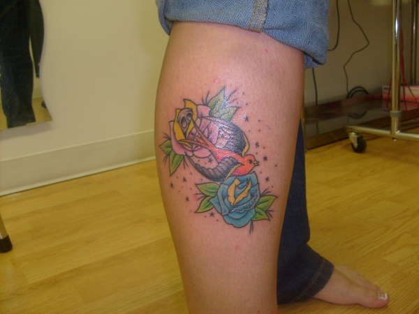 Sparrow and Roses tattoo