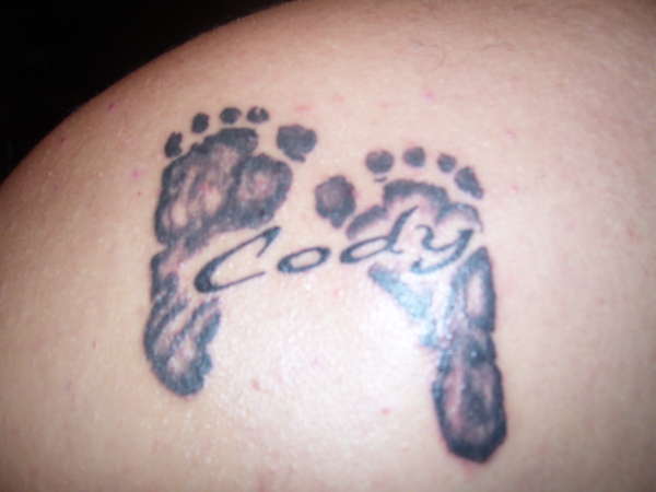 my sons name on my left sholder blade tattoo