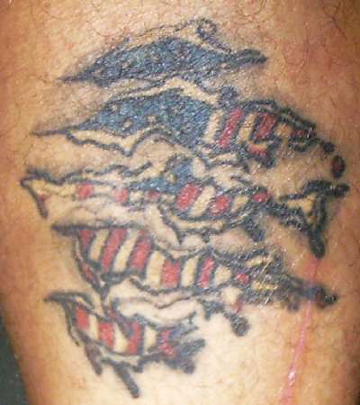 flag under the skin tattoo