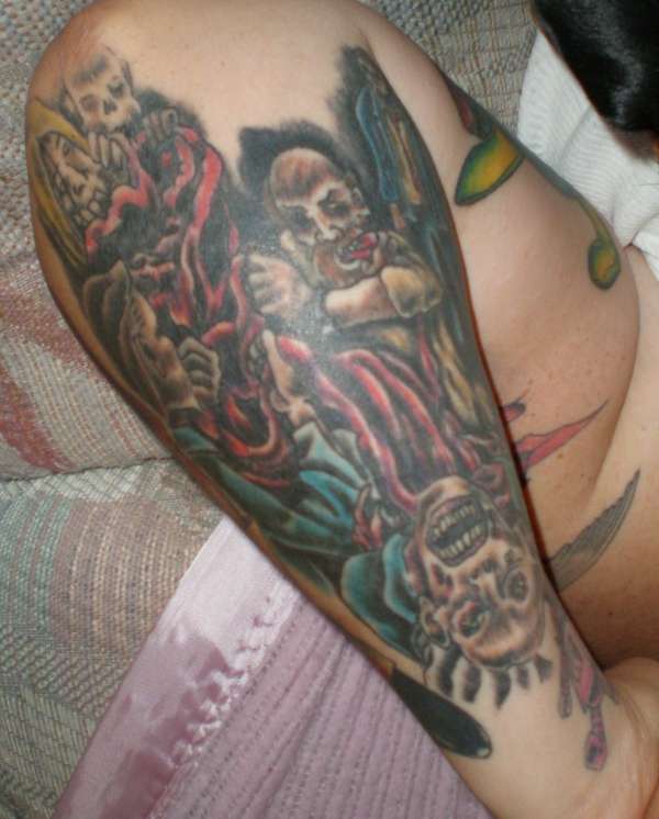 1/2 of my zombie 1/2 sleeve(sloppy pic) tattoo
