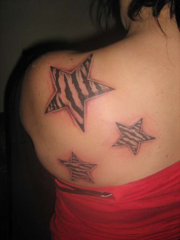 zebra/stars tattoo