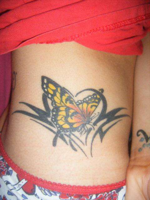 Tribal and Butterfly.... tattoo