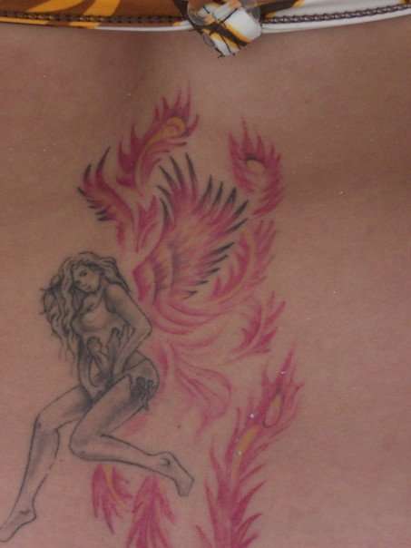 Phoenix tat of a girl tattoo