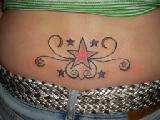 Stars on lower back tattoo