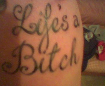 Lifes A Bitch tattoo