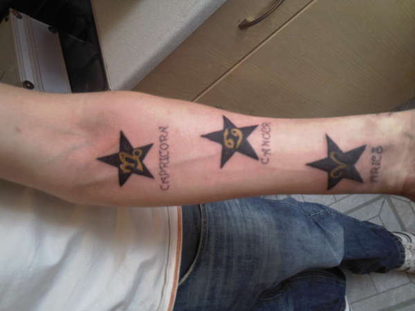 stars with star signs tattoo