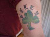 clover with last name tattoo