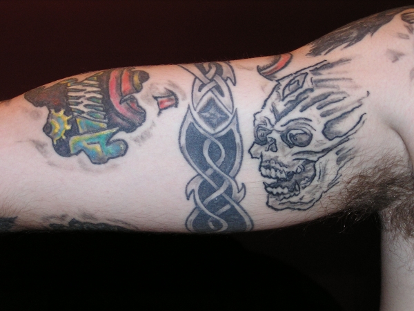 inner arm collage tattoo