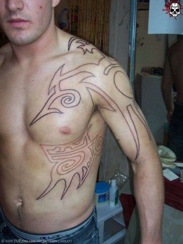 tribal leftarm piece outline tattoo