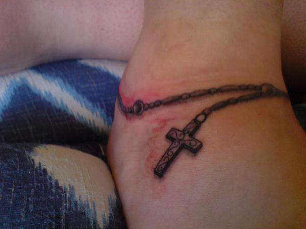 rosary beads around ankle/foot tattoo