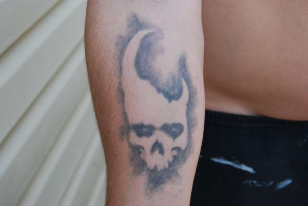 mist skull tattoo