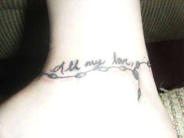 Other side of tat tattoo