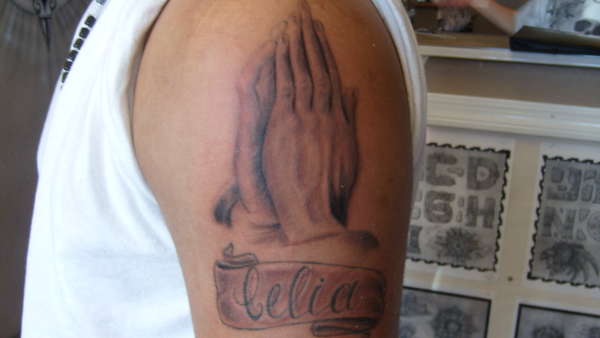 praying hands tattoo