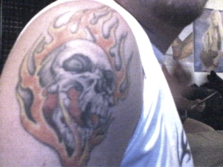 burning scull tattoo