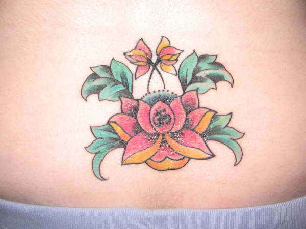 Lotus with Ohm tattoo