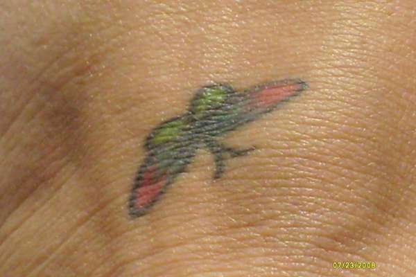 butterfly on foot tattoo