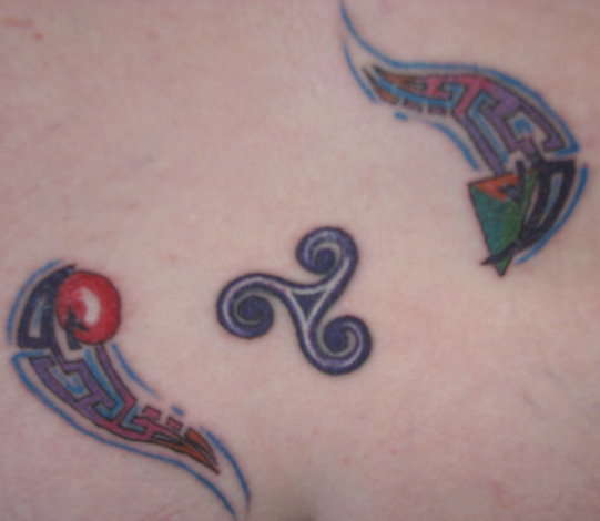 Triskele and decoration tattoo