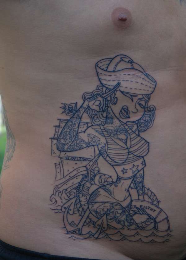 In progress rib piece tattoo