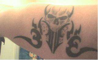 skull with tribal tattoo