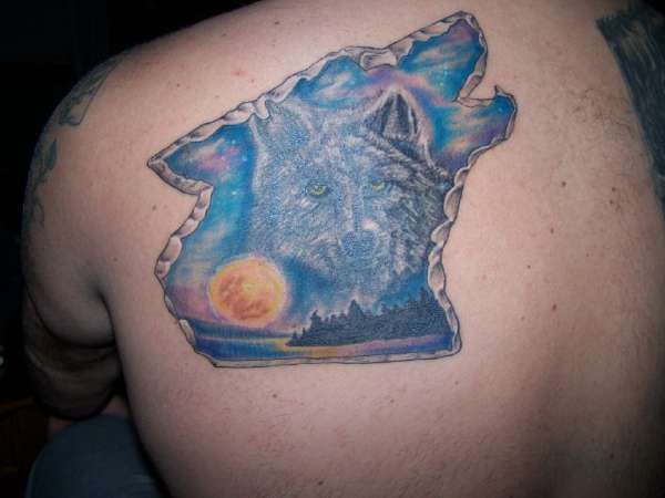 Wolf within wolf frame tattoo