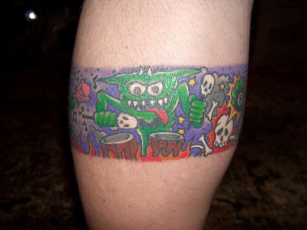 Back calf zombie band tattoo