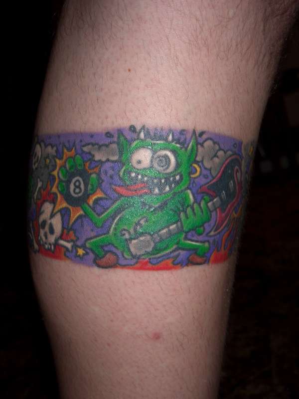 Inner leg zombie band tattoo