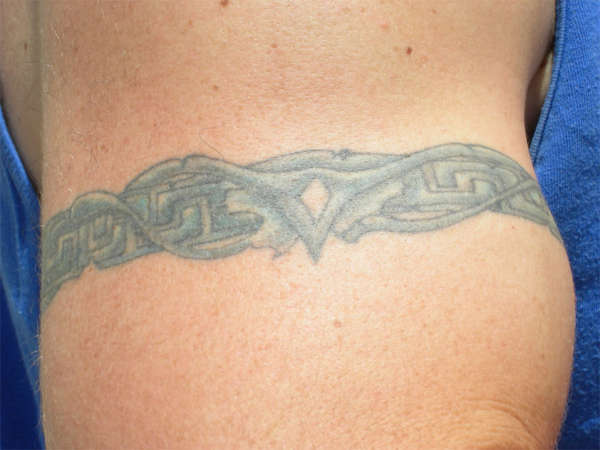 Tribal armlet tattoo