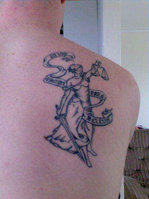 justice and war tattoo