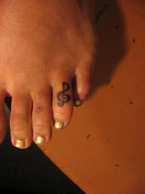 Treble Clef on Toe tattoo