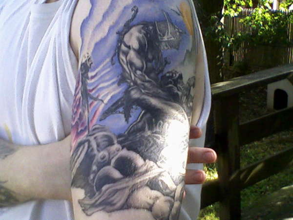 frazetta top of sleeve tattoo