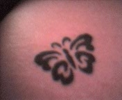 tribal butterfly tattoo