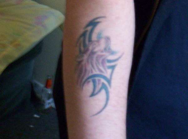 my first, got it at 18. tattoo